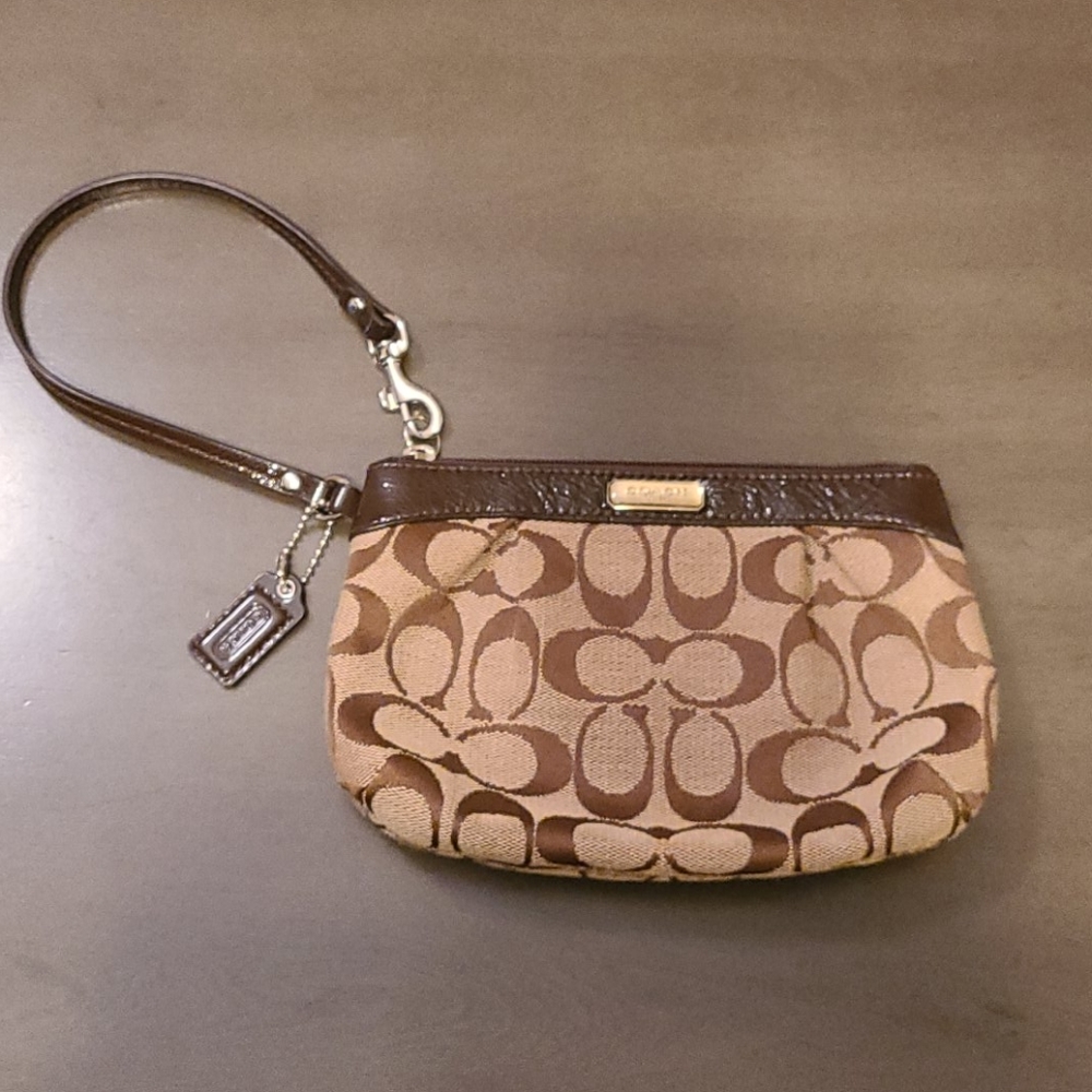 New without tags, tan and brown Coach wristlet